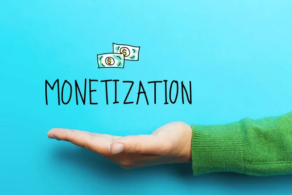 depositphotos 132018586 stock photo monetization concept with hand